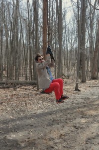 Arthur swinging on a vine.
